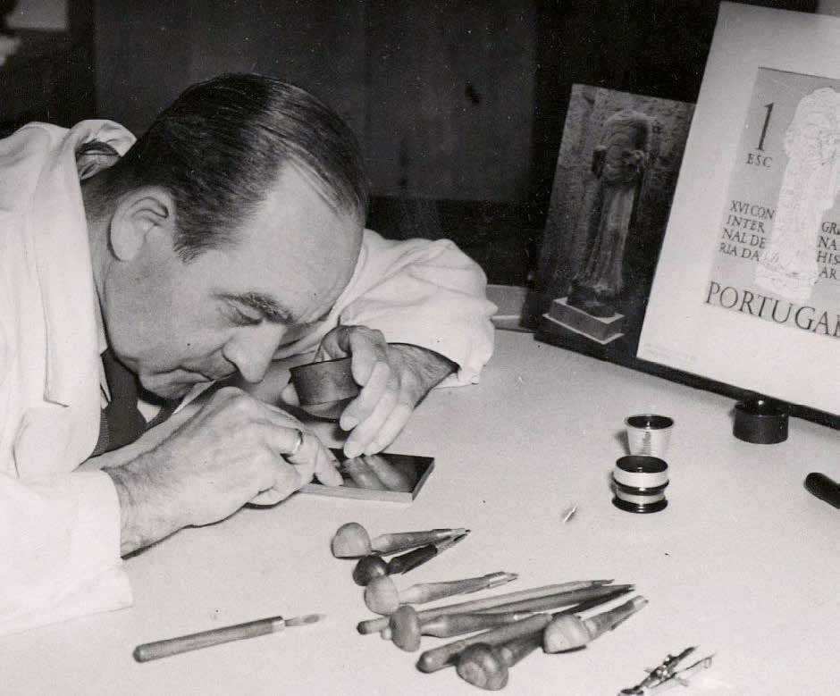 Engraver at work with loupe